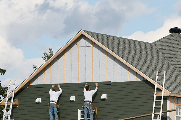 Professional Siding Installation technician working in Norfolk, VA
